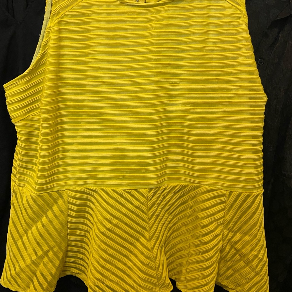Ashley Stewart size 26/28. Yellow peek-a-boo, peplum shirt